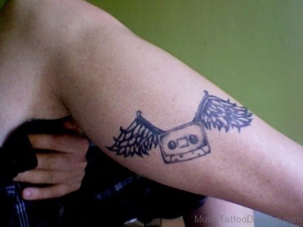 Winged Cassette Tattoo On Bicep
