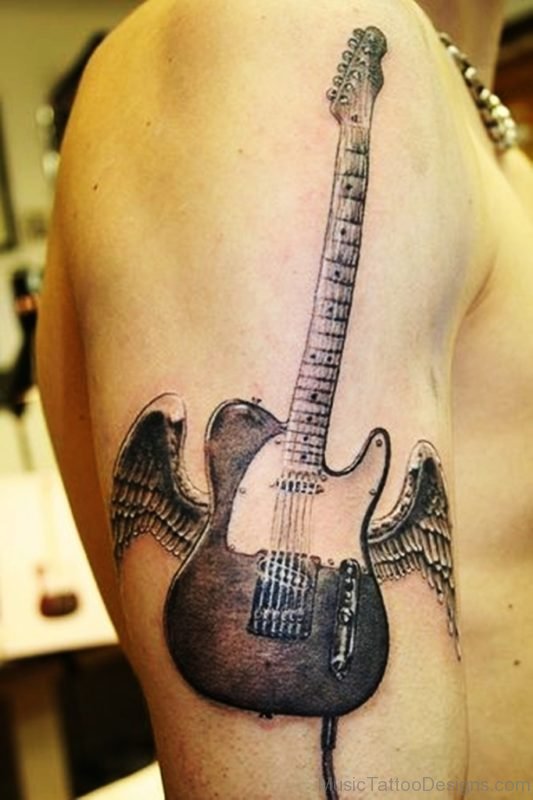 Winged Guitar Tattoo On shoulder