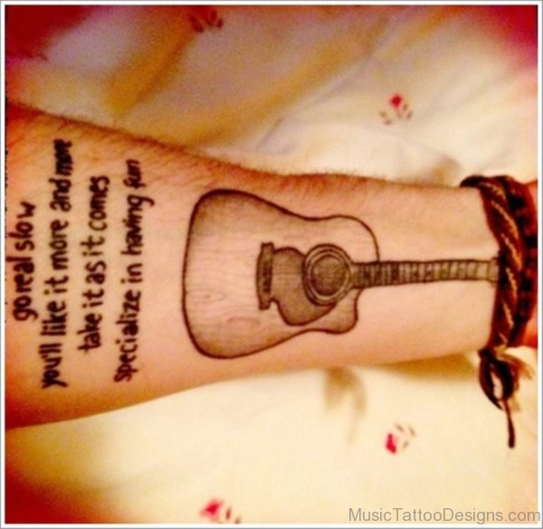 Wording And Guitar Tattoo On Wrist