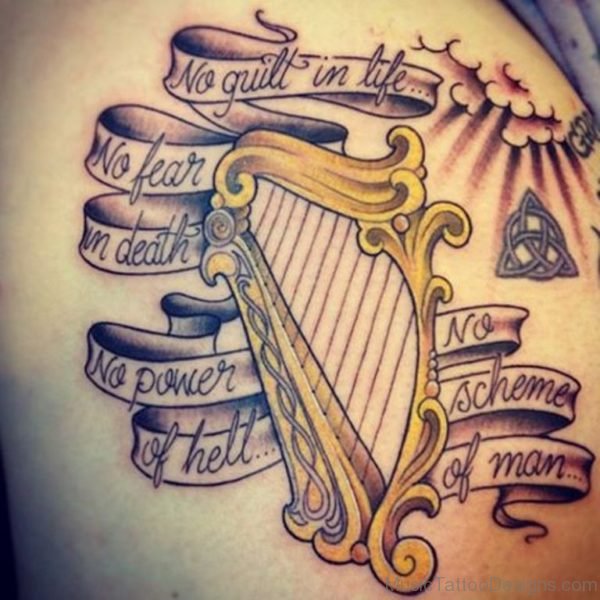 Wording And Harp Tattoo Image