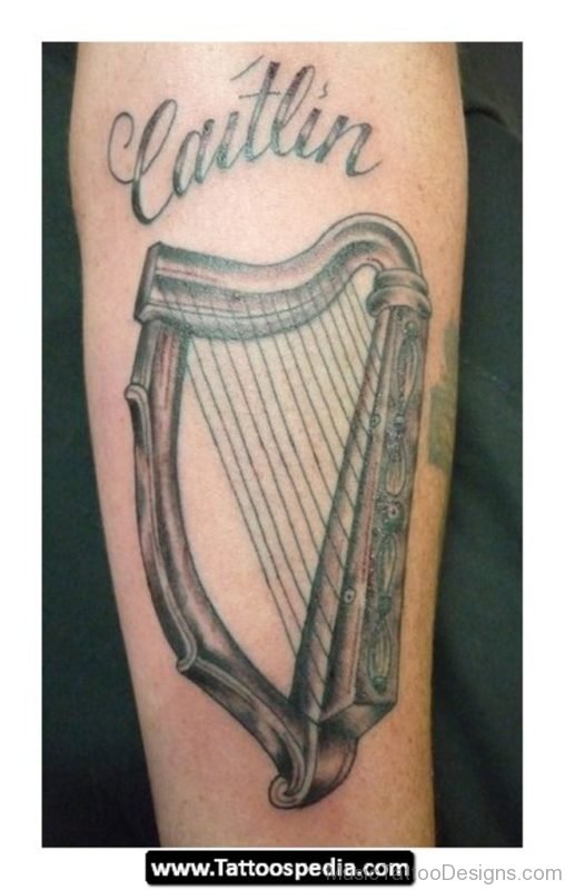 Wording and Harp Tattoo
