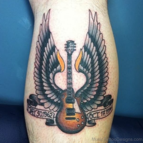 Winged Guitar Tattoo On Leg