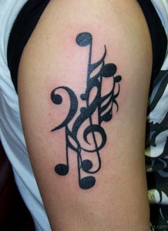 Attractive Music Tattoo On Shoulder