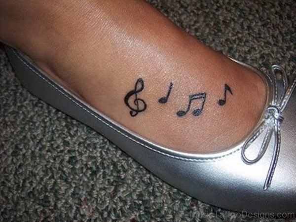 Black Music Note Tattoo On Foot