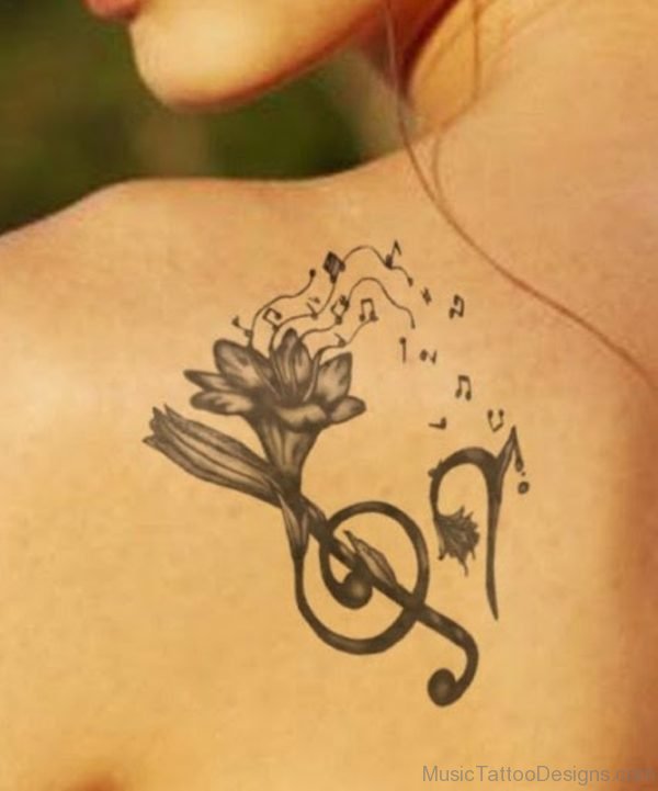 Flower and Music Tattoo On back