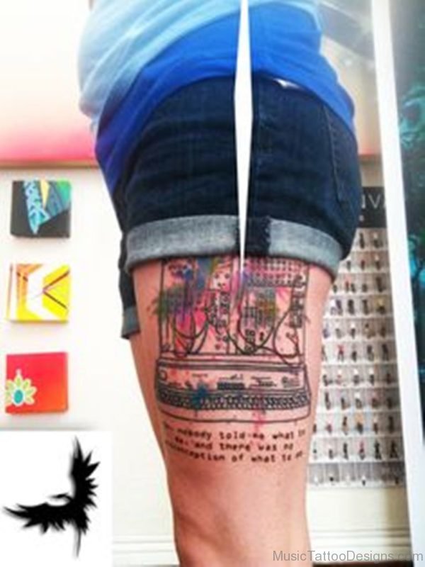 Graceful Synthesizer Tattoo On Thigh