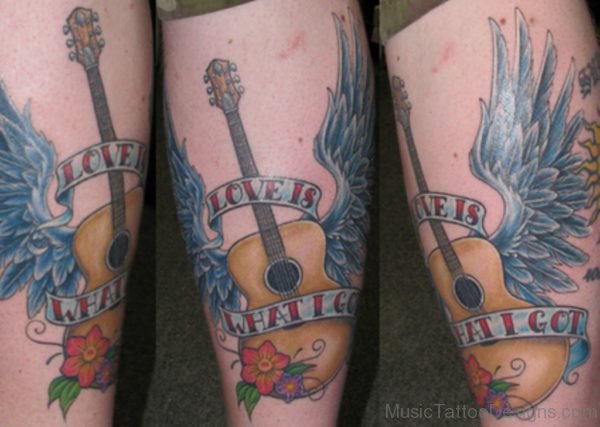 Lovely Guitar Tattoo On Leg