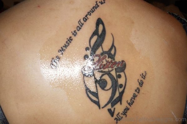 Muic Quote Tattoo On Backm