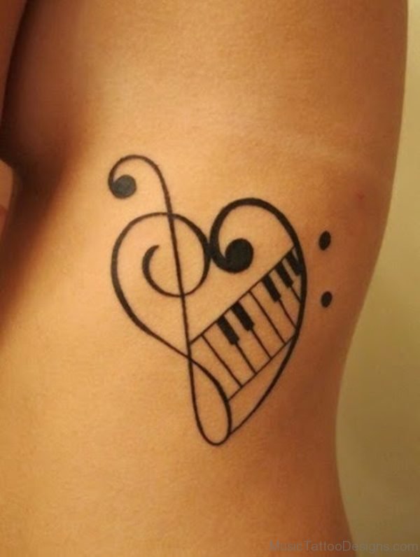 Music Tattoo On Guys Rib