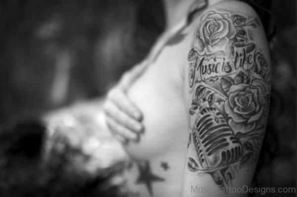 Rose And Music Tattoo On Shoulder