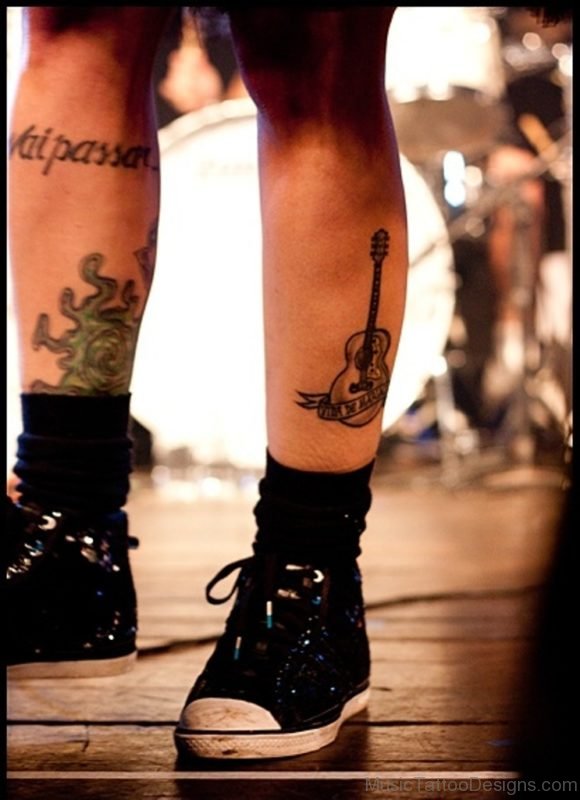 Small Guitar Tattoo On Leg